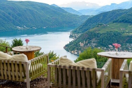 Lakeside terrace overlooking a mountain lake and hillside villages